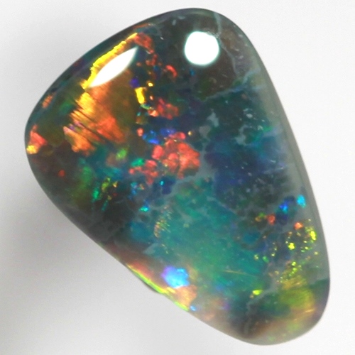 SOLID BLACK OPAL Bright and sparkling gold, cherry red over blue